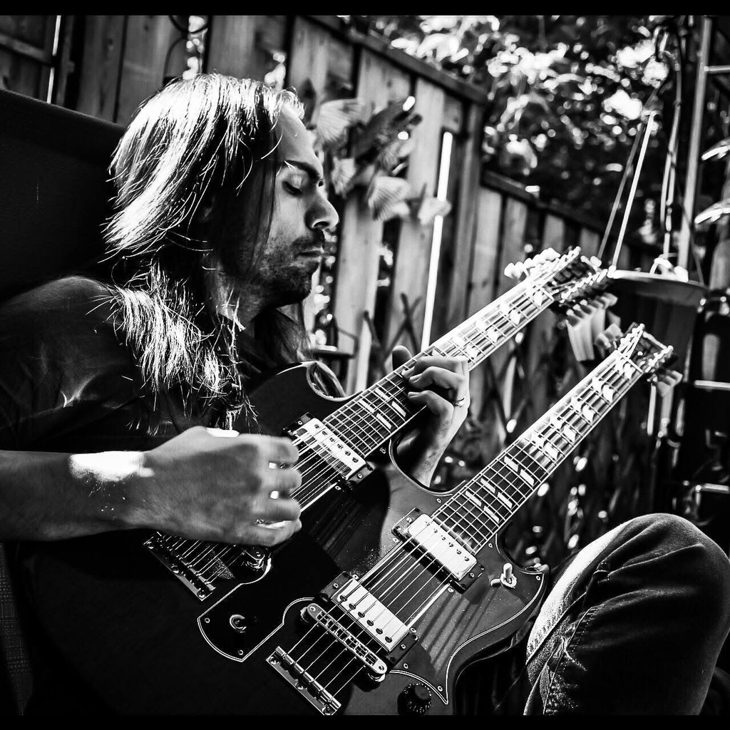 Chris with his fancy guitar looking overly serious